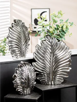 Produktbild von Gilde Vase, Blatt, Monstera, Keramik, silberfarben, VE 2 Höhe: 30.00 cm Breite: 23.00 cm Tiefe: 9.50cm 47483