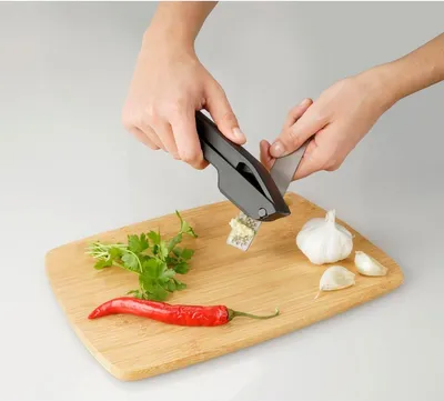 Immagine prodotto di Pressa per aglio Fackelmann in acciaio inox nero 175 cm - Utensili da cucina di qualità Pressa per aglio