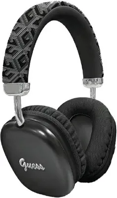 A pair of black GUESS headphones with a patterned headband.