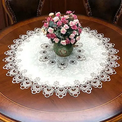 Produktbild von Runde Tischdecke mit Spitzenblumenmuster und Quasten, einfarbig, 70 cm