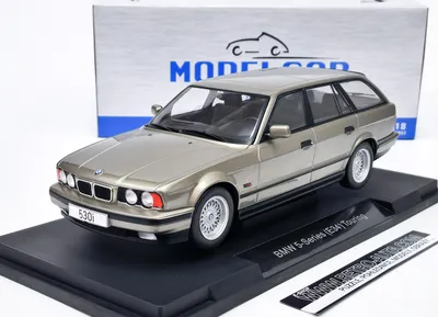 Zdjęcie produktu dla BMW 5er (E34) Touring 1991 - metaliczny szary MCG 1:18