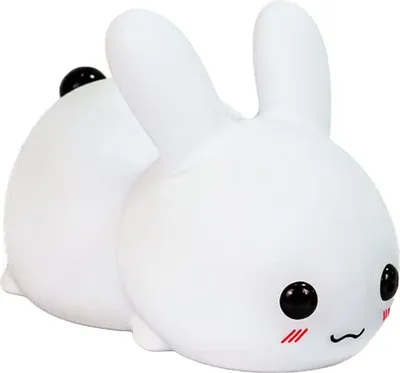A white, cartoon-like rabbit-shaped night light with black eyes and red blush marks.