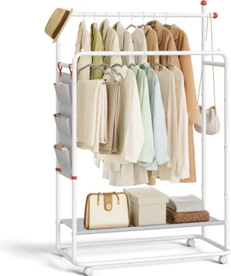 A white garment rack with clothes hanging on it and accessories on the shelves.