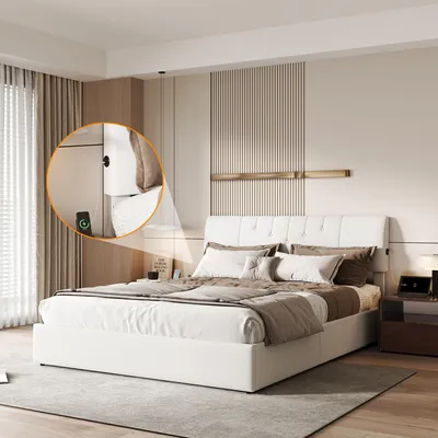 A bedroom scene featuring a white upholstered bed with storage, bedside tables, and decorative wall paneling.