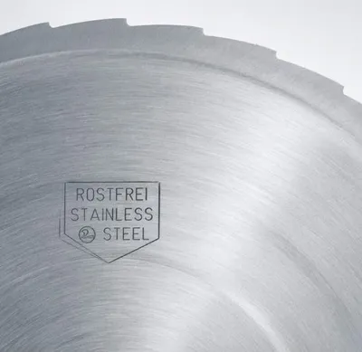 Close-up of a circular saw blade made of stainless steel.