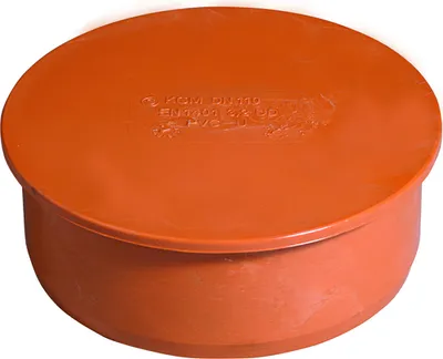 A close-up, studio shot of an orange pipe cap on a white background.