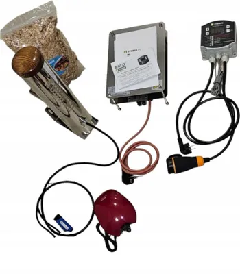 A collection of items for an electric smoking chamber, including a smoke generator, control unit, and wood chips.