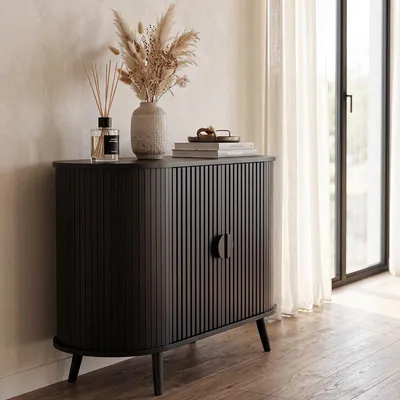 Produktbild von Ovale Kommode Schwarz – Lamellentüren – 95 x 40 x 70 cm