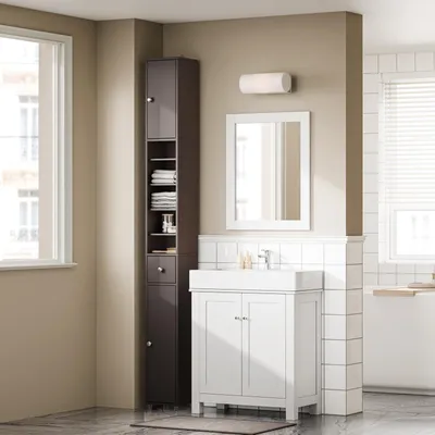 A modern bathroom with a tall brown cabinet, a white vanity with a sink and mirror, and a bathtub.
