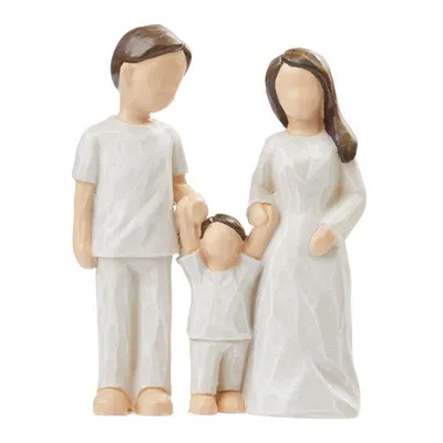 A figurine of a family of three.