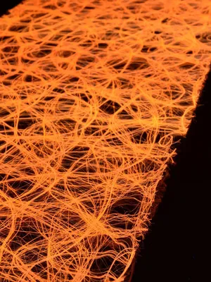 Produktbild von 1lfm PSYWORK Schwarzlicht Dekovlies Grob Orange, 30cm
