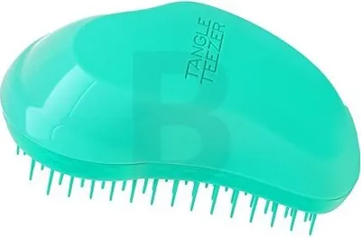 A teal Tangle Teezer hairbrush is shown against a white background.