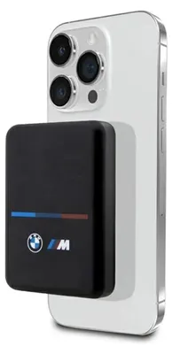 A black power bank with BMW M branding is attached to the back of a white smartphone.