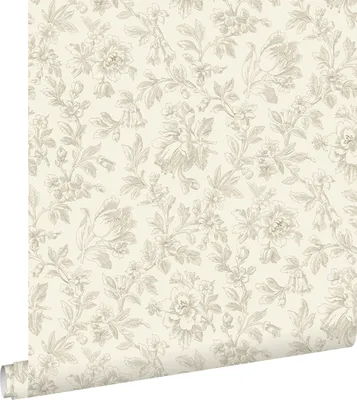 A roll of wallpaper with a floral pattern.