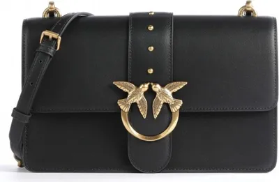 A black leather handbag with gold hardware.