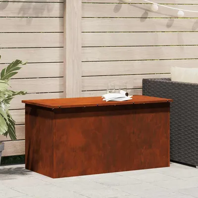 An outdoor patio setting with a storage box and seating.