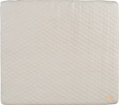 A flat lay of a quilted changing pad.