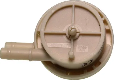 A close-up view of a beige flowmeter with two hose connectors.