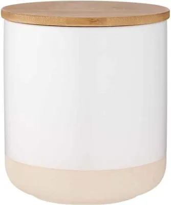 A white ceramic canister with a bamboo lid.