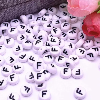 Produktbild von Buchstaben Perlen, 30 Stück, 4x7 mm, weiß mit schwarz, rund, Buchstabe F