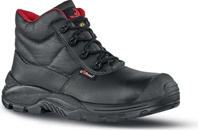 A black high-top work boot with red accents is shown against a white background.