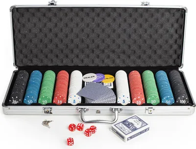 An open aluminum poker case filled with poker chips, playing cards, and dice.