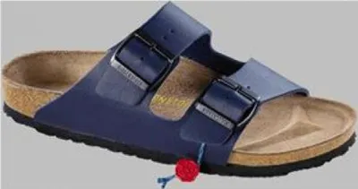 A single blue Birkenstock sandal is shown against a plain gray background.