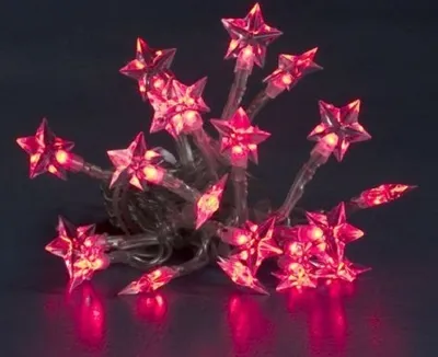 A cluster of red star-shaped LED lights on a dark background.