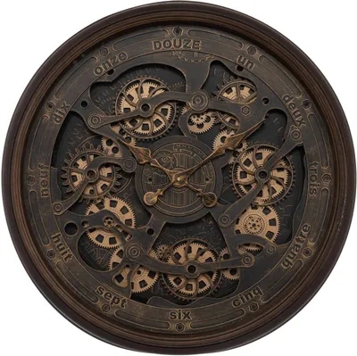 A close-up, front-facing view of a large, vintage-style wall clock with a visible, intricate gear mechanism.