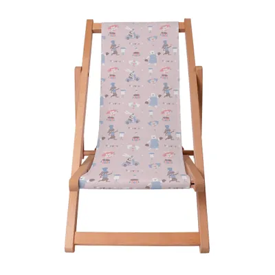 A wooden deck chair with a patterned fabric seat.