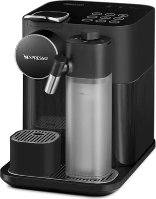 Close-up studio shot of a black Nespresso coffee machine.