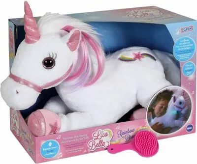 A plush unicorn toy in its packaging, with a brush and a picture of a child holding a similar toy.
