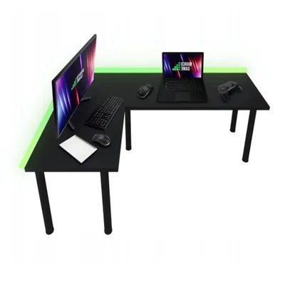 A black L-shaped gaming desk with a monitor, laptop, keyboard, mouse, and controller, illuminated by green LED lights.