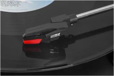 A close-up shot of a record player's stylus on a vinyl record.