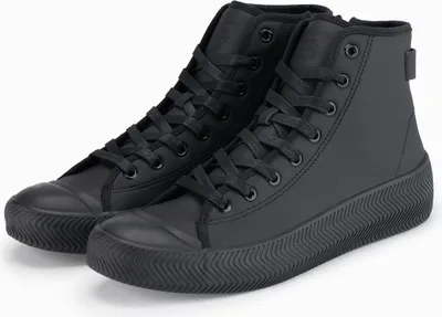 A pair of black high-top sneakers with a thick, textured sole, shown against a white background.