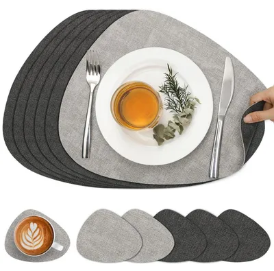 Immagine prodotto di Set di tovagliette e sottobicchieri in aspetto pelle, color grigio chiaro, confezione da 6, dimensioni 40,5 x 33 cm