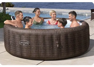 Produktbild von Bestway® LAY-Z-SPA® Energiespar-Whirlpool Bali AirJet™ mit App-Steuerung + integrierter UltraFit™ -Pumpeneinheit, für 7 Personen Ø 216 x 71 cm, Rattan-Optik (Schokobraun)