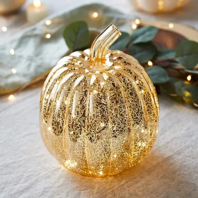 Imagen del producto de Calabaza de vidrio con luces LED, funciona con batería, decoración otoñal, color dorado, ideal para Halloween, 21 cm
