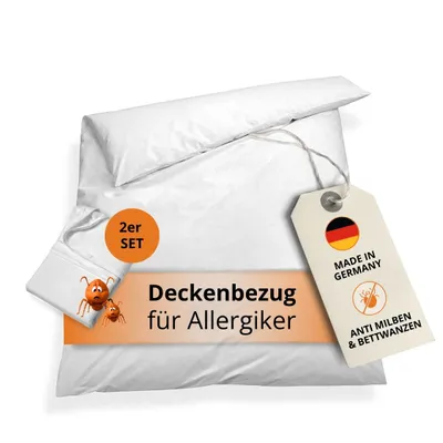 A white duvet cover set is folded and presented with a tag and a circular label.