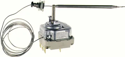 A thermostat with a coiled wire and a metal probe against a white background.