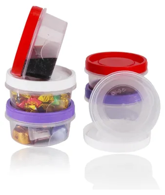 A stack of small, clear plastic food containers with colored lids and bands, some filled with candies and a dark liquid.