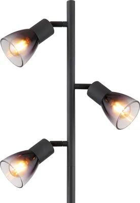 A close-up shot of a black floor lamp with three adjustable spotlights.