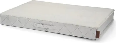 A product shot of a rectangular cushion on a white background.