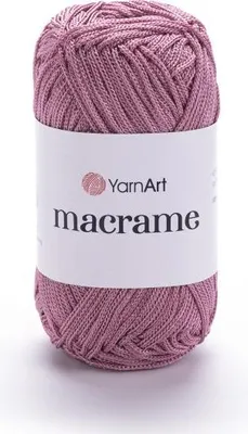 A ball of pink yarn with a white label.