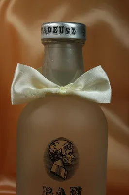 Produktbild von Flaschenhänger 12 Stück Schleifen Creme
