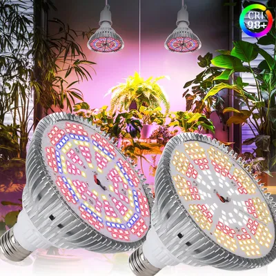 Two LED grow lights are shown in the foreground, with lush green plants in the background under pink and purple lighting.