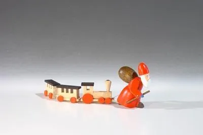 Produktbild von Holzfigur Weihnachtsmann mit Eisenbahn  Höhe 4,5cm NEU