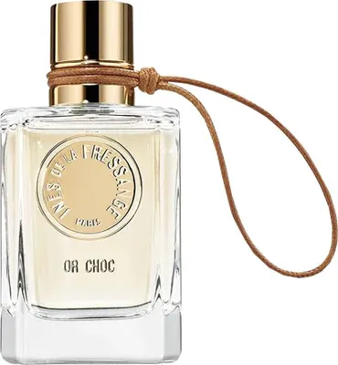 A close-up studio shot of a perfume bottle.