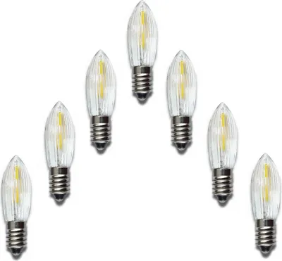A group of LED filament bulbs arranged in a semi-circle on a white background.