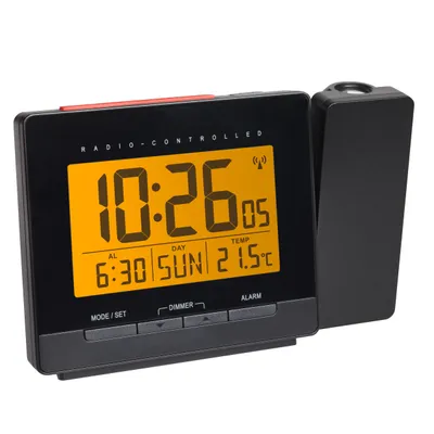 A black digital alarm clock with a projection unit on the side, displaying the time, date, and temperature.